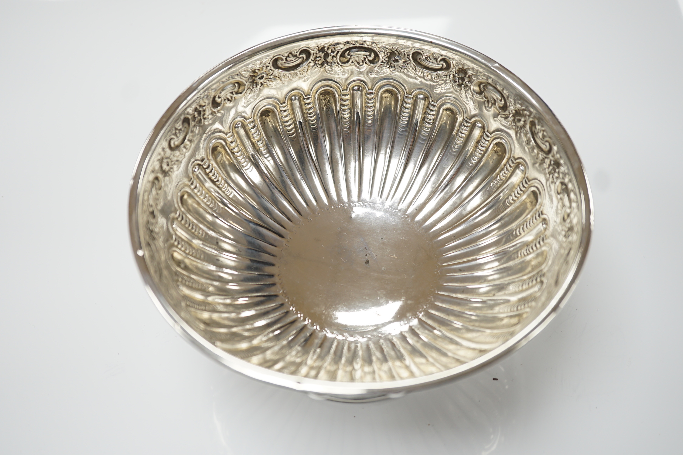 A late Victorian repousse silver small rose bowl, James Deakin & Sons, Sheffield, 1897, diameter 16.6cm, 7oz.